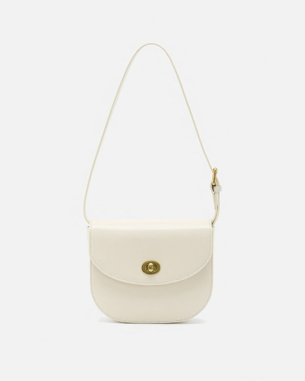 Front view of an off-white classic leather flap saddle crossbody bag with a gold turn-lock closure.