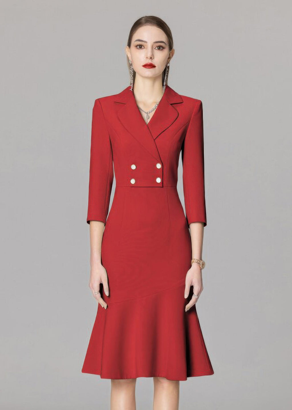 A front-facing studio shot of a model wearing the same blazer dress design, but in a vibrant red color.