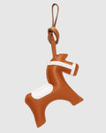 Back view of an equestrian leather horse bag charm showing fine edge stitching and goatskin texture.