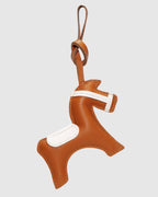 Back view of an equestrian leather horse bag charm showing fine edge stitching and goatskin texture.