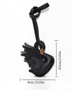 Size dimension diagram of black swan leather charm measuring 8cm width and 8.5cm height.