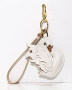 Off-white leather swan bag charm featuring gold swivel snap hook clasp.