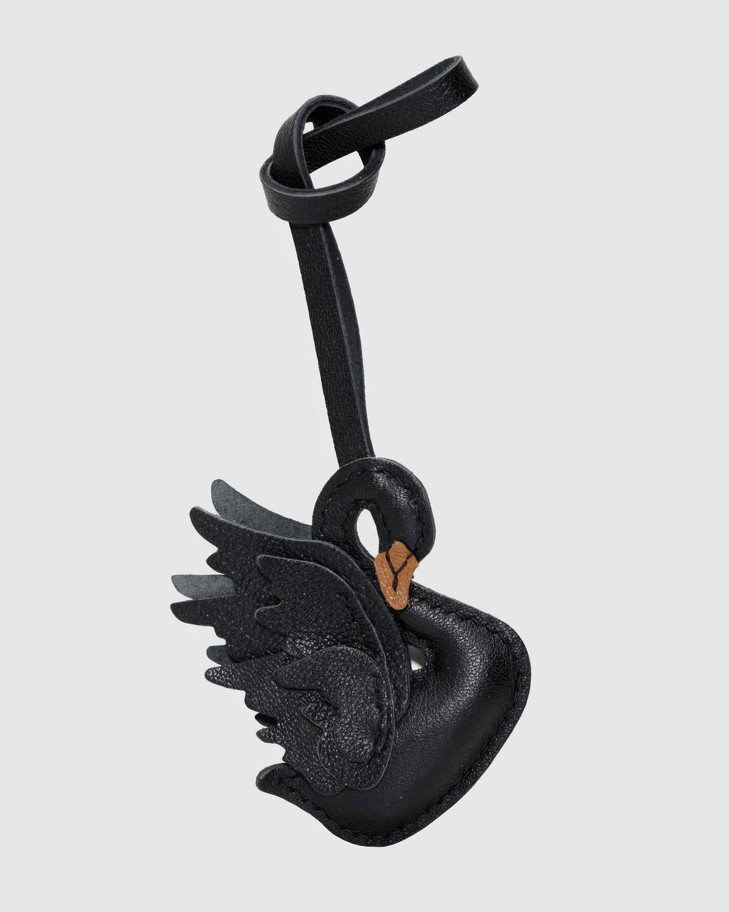 Front view of graceful black swan French goatskin leather bag charm.