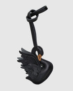 Front view of graceful black swan French goatskin leather bag charm.