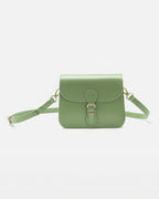 Front product view of a sage green leather flap crossbody bag with a gold buckle closure and matching shoulder strap.