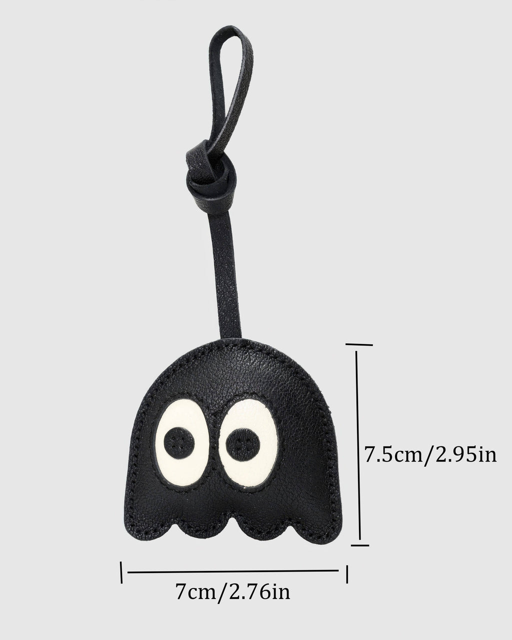 Size diagram of black ghost leather bag charm showing dimensions 7cm width and 7.5cm height.