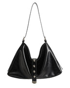 Studio product image of black crinkled faux leather slouchy shoulder bag with silver star studs on white background