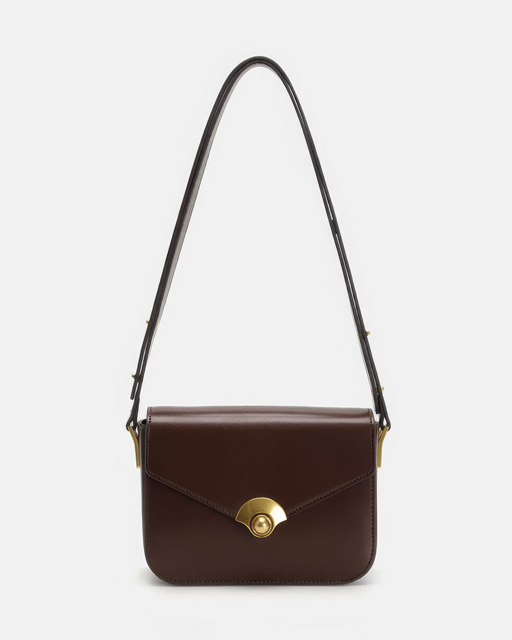 Dark brown leather flap shoulder bag featuring a gold fan-shaped turn-lock closure on white studio background.
