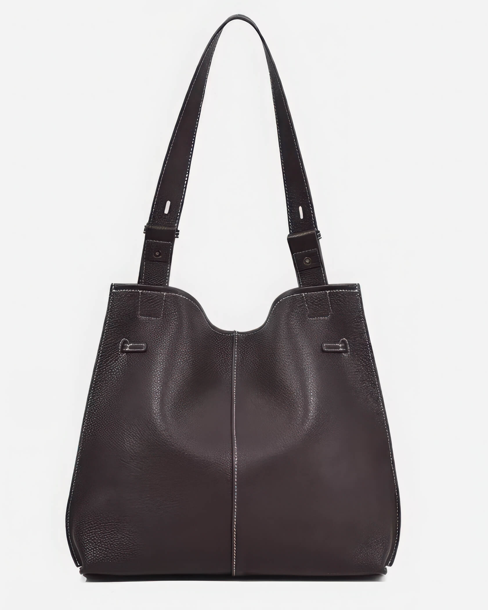 Top-down view of an open burgundy leather handbag showcasing its large storage capacity.