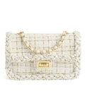 Studio product shot of cream woven tweed crossbody bag with gold turn-lock closure on white background