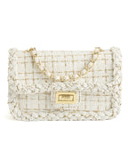 Studio product shot of cream woven tweed crossbody bag with gold turn-lock closure on white background